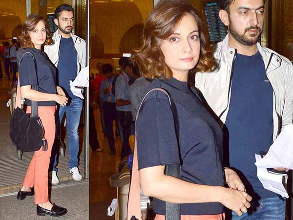 Dia Mirza in orange pants at the airport