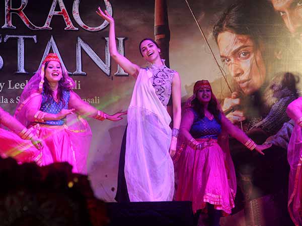 Deepika in white tunic at Bajirao Promotions