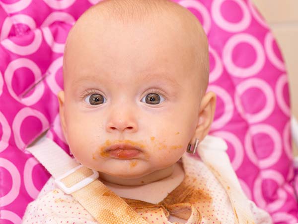 baby spits up after feeding