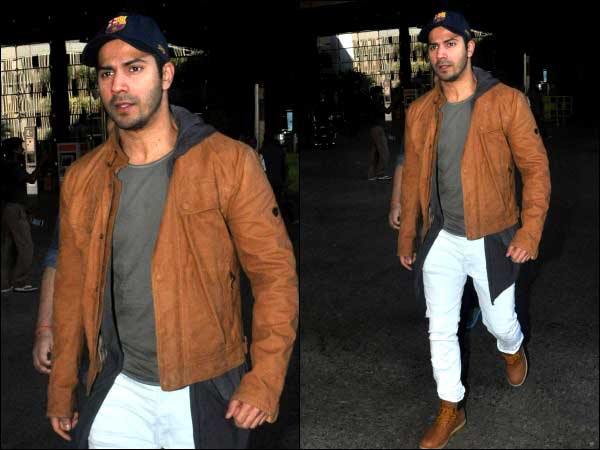 Varun Dhawan in tan jacket