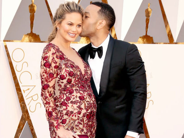 Chrissy & John Having A Moment