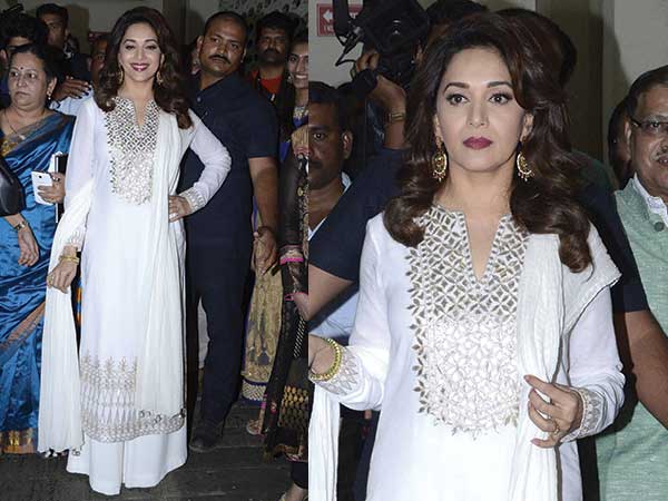 In Anita Dongre white suit