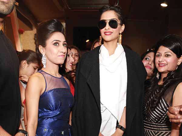 Sonam in a black jacket