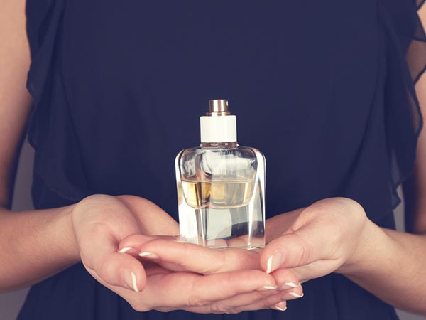 Girl Putting Perfume