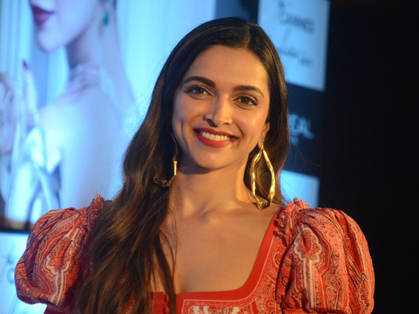 deepika wearing alexander mcqueen midi dress