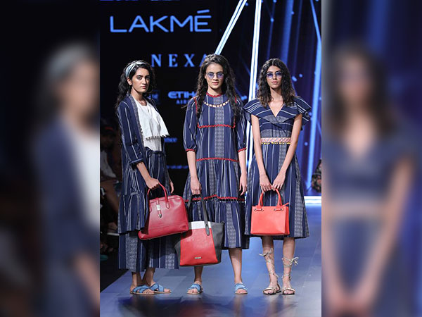 Rhea Chakraborty was the showstopper for Caprese at the Lakme Fashion Week, Winter/Festive 2017. Among all the models that showcased the bright and classy bag collection by Caprese, and walked the ramp with swag and style, Rhea too carried a fancy handbag from Caprese and flaunted it stylishly. Rhea wore a frock dress which had pretty ruffled sleeves and carried the dark peach coloured handbag which totally matched with the dress. Rhea looked very pretty and also too cute in the super cool style file. 