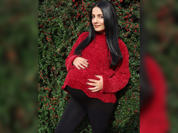 celina jaitly showcasing her baby bump