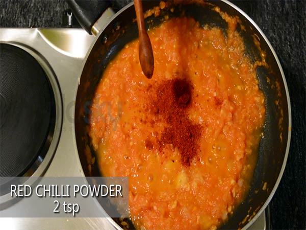 1. Add 2 tablespoons of olive oil to a heated pan. 2. Add the chopped garlic cloves and fry it for half a minute. 3. Add the finely chopped onion and saute for a minute. 4. Then, add 2 cups of tomato puree and saute again for 3 to 4 minutes, until the tomato juice evaporates. 5. Add a teaspoon of salt and 2 teaspoons of red chilli powder. 6. Add 2 teaspoons of mixed herbs and half a cup of ketchup or tomato sauce. Mix well. 7. Saute for 3-4 minutes. 8. Turn off the stove and this can be used as per your preference.