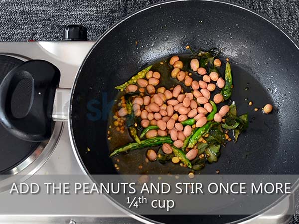 1. Add poha in a large bowl. Add water until the poha is completely immersed. 2. Rinse it thoroughly. 3. Once done, drain the water using a sieve. 4. Add the washed poha in another bowl. 5. Add a bowl of water or a little more than that. 6. Allow it to soak for 10 minutes. Keep it aside. 7. Now, add oil in a heated saucepan. 8. Add mustard seeds and allow it to splutter. 9. Add urad dal and chana dal. 10. Add curry leaves and the slit green chillies. 11. Then, add turmeric powder and stir well. 12. Add the peanuts and stir once more. 13. Sauté for 2 minutes, until the peanuts change its colour. 14. Add the chopped onions and mix well. 15. Add half a teaspoon of salt and mix again. 16. Add the chopped carrots and capsicum. 17. Sauté it for 2 minutes. 18. Further, add the soaked poha by leaving out the water. 19. Mix well, so that the poha blends with all other ingredients. 20. Add half a tablespoon of salt. 21. Add 2 tablespoons of each, chopped coriander leave and grated coconut. Turn off the stove. 22. Finally, add lime juice to get the tangy flavour and mix it one last time. 23. Transfer it into a bowl. 24. Garnish it with coconut and coriander leaves. 25. Serve hot.
