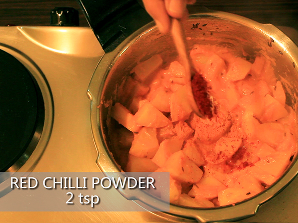  STEP BY STEP – HOW TO MAKE ALOO MUTTER GRAVY 1. Add a tablespoon of oil in a heated pan. 2. Add the chopped onions. 3. Sauté well until it turns to golden brown in colour. 4. Add the cut tomatoes and sauté continuously for a minute to avoid it from burning. 5. Add the grated ginger and 4 garlic cloves. 6. Add the chopped green chillies and sauté well for a minute. 7. It is done once the skin of the tomatoes starts to peel off. 8. Allow it to cool for 10 minutes. 9. Meanwhile, take 3 washed potatoes and peel the skin off. 10. Further, cut it into cubes. Keep it aside. 11. Add the sautéed mixture in a mixer jar. 12. Grind it into a smooth paste. Keep it aside. 13. Now, add 2½ tablespoons of oil in a heated pressure cooker. 14. Add jeera and allow it to splutter. 15. Add the cut potatoes and stir well. Let it cook for a minute. 16. Add the ground paste and mix it well. 17. Then, add salt and turmeric powder. 18. Add red chilli powder and dhaniya powder to spice up the dish. Mix well. 19. Add the green peas and mix it again. 20. Further, add a cup of water. 21. Close the lid and pressure cook it for upto 3 whistles. 22. Once done, take it off the stove and allow the pressure to settle. 23. Now, open the lid and add garam masala and jeera powder to it. 24. Finally, garnish it with coriander leaves. 25. Serve hot.