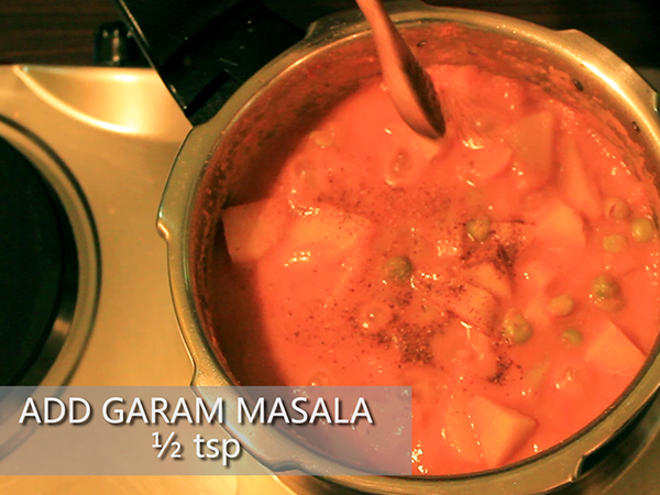  STEP BY STEP – HOW TO MAKE ALOO MUTTER GRAVY 1. Add a tablespoon of oil in a heated pan. 2. Add the chopped onions. 3. Sauté well until it turns to golden brown in colour. 4. Add the cut tomatoes and sauté continuously for a minute to avoid it from burning. 5. Add the grated ginger and 4 garlic cloves. 6. Add the chopped green chillies and sauté well for a minute. 7. It is done once the skin of the tomatoes starts to peel off. 8. Allow it to cool for 10 minutes. 9. Meanwhile, take 3 washed potatoes and peel the skin off. 10. Further, cut it into cubes. Keep it aside. 11. Add the sautéed mixture in a mixer jar. 12. Grind it into a smooth paste. Keep it aside. 13. Now, add 2½ tablespoons of oil in a heated pressure cooker. 14. Add jeera and allow it to splutter. 15. Add the cut potatoes and stir well. Let it cook for a minute. 16. Add the ground paste and mix it well. 17. Then, add salt and turmeric powder. 18. Add red chilli powder and dhaniya powder to spice up the dish. Mix well. 19. Add the green peas and mix it again. 20. Further, add a cup of water. 21. Close the lid and pressure cook it for upto 3 whistles. 22. Once done, take it off the stove and allow the pressure to settle. 23. Now, open the lid and add garam masala and jeera powder to it. 24. Finally, garnish it with coriander leaves. 25. Serve hot.