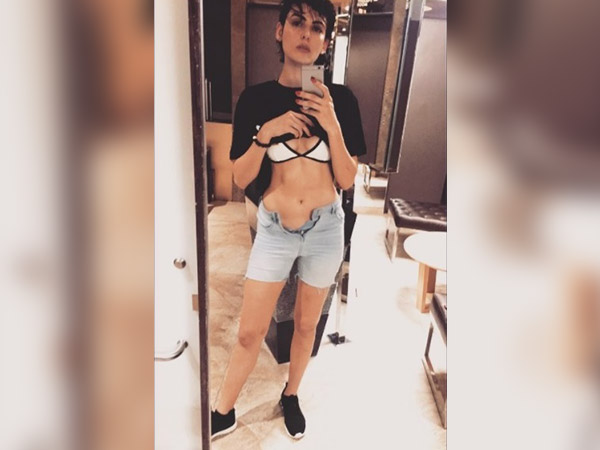 mandana karimi trolled for sharing buttonless pic