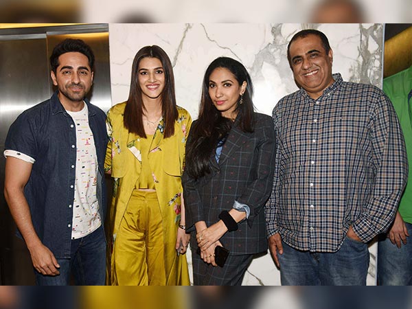 nidhhi agerwal and kriti sanon wearing satin outfits at padman screening