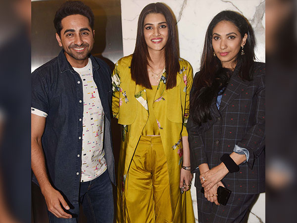 nidhhi agerwal and kriti sanon wearing satin outfits at padman screening