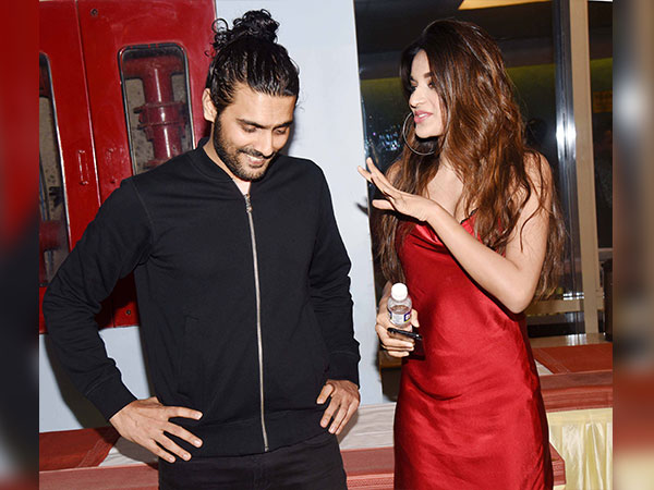 nidhhi agerwal and kriti sanon wearing satin outfits at padman screening