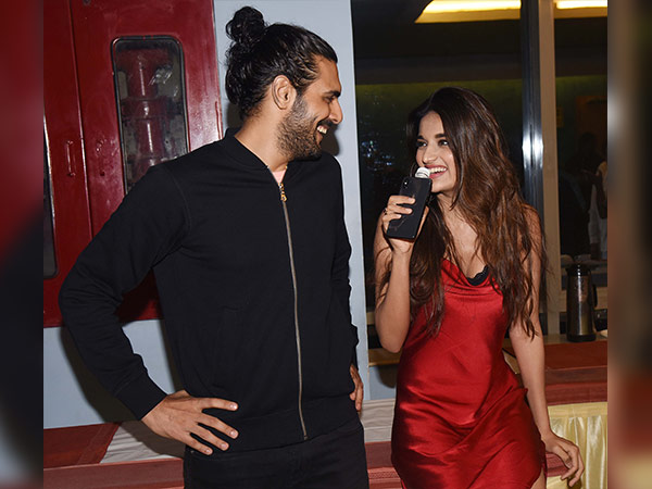 nidhhi agerwal and kriti sanon wearing satin outfits at padman screening