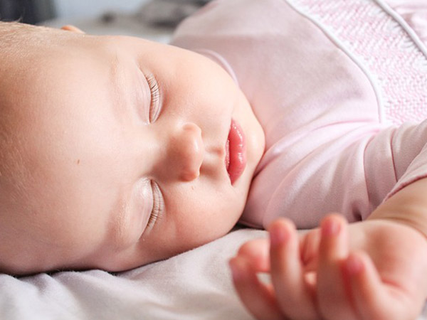 12.) Elevate the baby’s head with a pillow