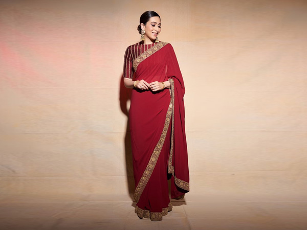 Karisma Kapoor’s Blood Red Sari And Striped Blouse