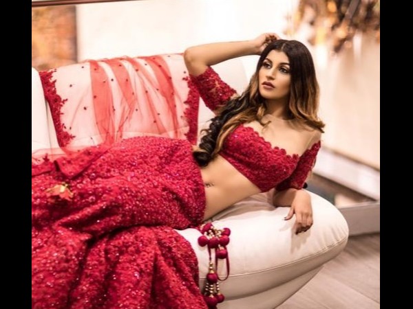 Karishma Tanna and Yashika Aannand in red outfits Karishma Tanna and Yashika Aannand in red outfits