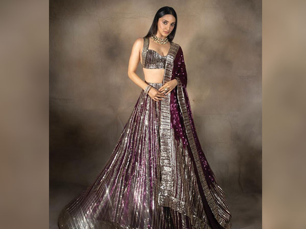 Kiara Advani In A Plum Wine Metallic Lehenga