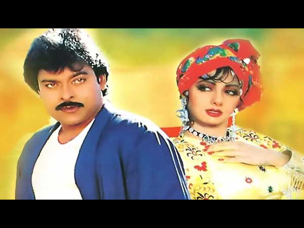 Sridevi In A Green Traditional Attire The poster of the film showed Sridevi dressed in green traditional attire. Her ensemble consisted of a sleeveless sweetheart-neckline blouse, which was accentuated by golden embroidered patterns. She paired it with matching flared bottoms while the light-green hued band-type belt added structure to her attire. Her jewellery game was very strong. She accessorised her look with a pair of white-pearl detailed gold-toned earrings, multi-layered choker, armlets, bracelets, and red nail paint. Sridevi pulled back her tresses into a hairdo. A white-pearl detailed green and gold-toned accessory covered her hair and forehead. Filled brows, kohled eyes, curled lashes, green eye shadow, and glossy pink lip shade rounded out her look. Sridevi In A Yellow Ensemble And Red Turban One of the looks of Sridevi from the film that impressed us was her yellow ensemble with red turban. It was full-sleeved round-collar yellow kurti type attire, which was accentuated by multi-hued prints. She notched up her look with a pair of silver-toned earrings, heavy necklace, and red nail paint. She sported a red-turban that also featured multi-hued patterns. The fringes suited her well and she wrapped up her look with filled brows, kohled eyes, curled lashes, pink eye shadow, and red lip shade. Sridevi absolutely impressed us with her gorgeous looks. Talking about the film, in one of the videos shared by the filmmaker on twitter, he revealed that the sequel of the film is on the cards. Well, that’s really a good news for all the viewers who loved watching this film. Meanwhile, do not forget to share your opinions on these looks of Sridevi.