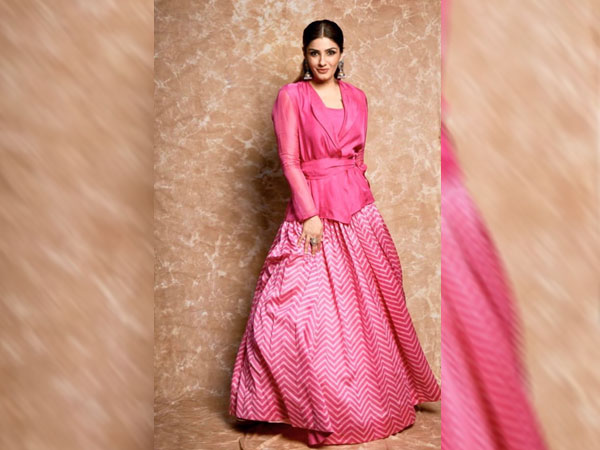 Raveena Tandon In A Top And Skirt