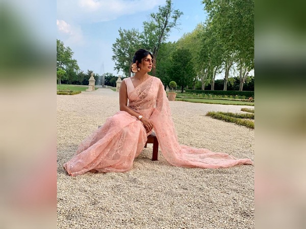 Priyanka Chopra Jonas in a Baby Pink chiffon Saree