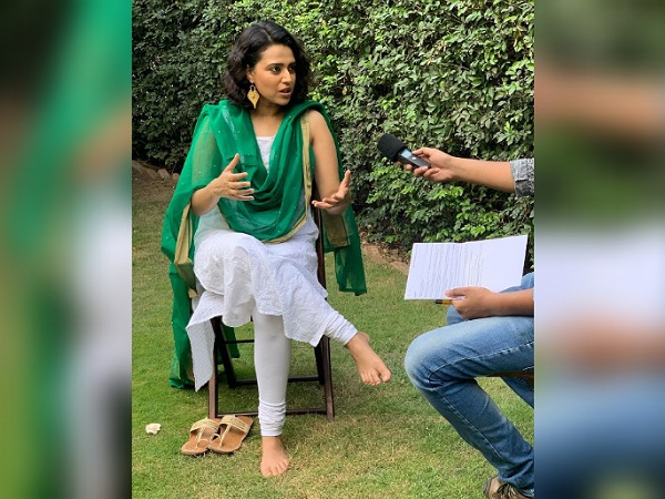 Swara Bhasker In A White Suit With Green Dupatta Swara Bhasker In A White Suit With Green Dupatta
