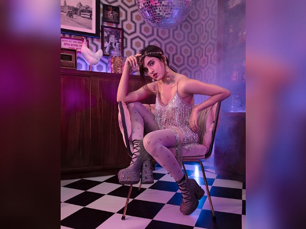 Shirley Setia In A Shimmering Silver Dress