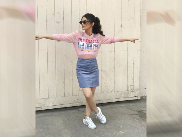 Radhika Madan In A Pink Top And Denim Skirt