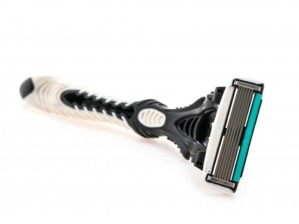 4. Run The Razor Under Hot Water