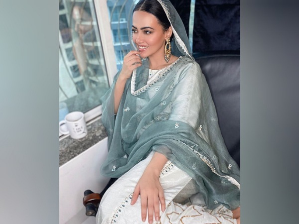 Sana Khan In A White Sober Suit