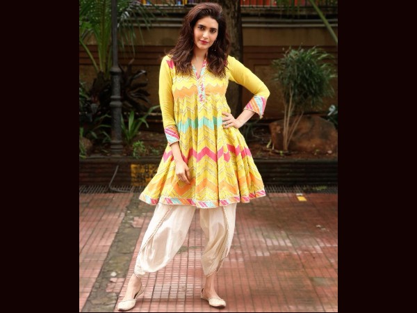 Karishma Tanna In Yellow Ensemble For Ganpati Celebration