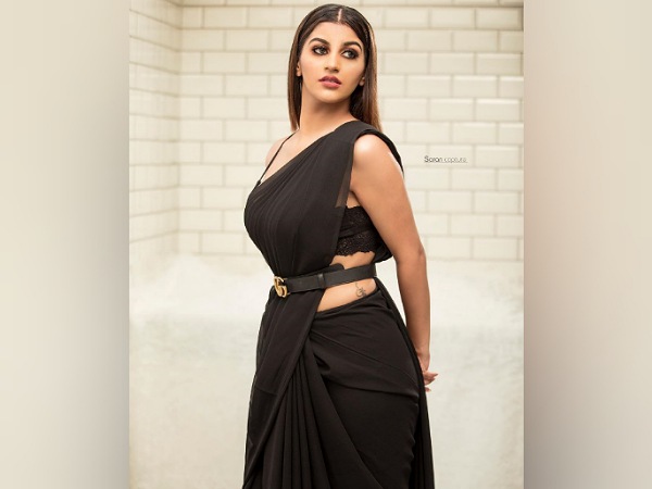 Yashika Aannand In A Black Belted Saree Yashika Aannand In A Black Belted Saree