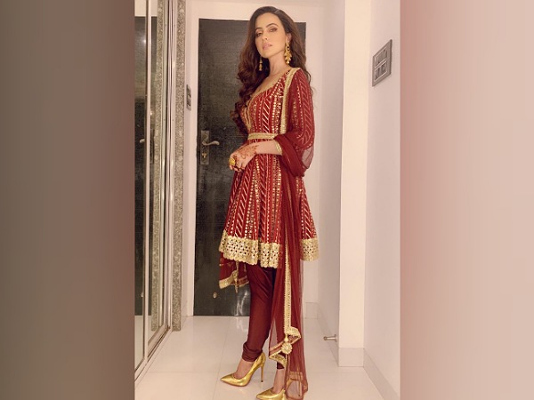 Sana Khan’s Red Suit