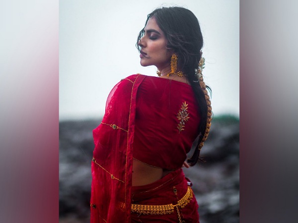Malavika Mohanan In A Red Bridal Saree
