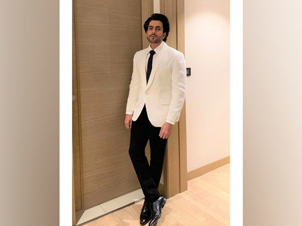 Sunny Singh In A White Blazer And Black Pants