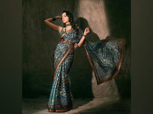 Nora Fatehi In A Blue Printed Saree