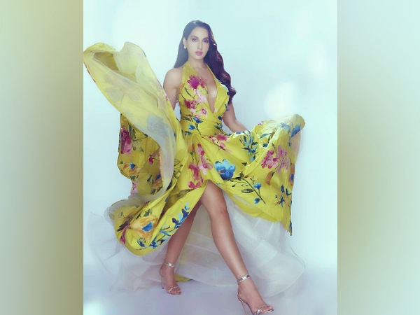 Nora Fatehi’s Floral Printed Yellow Gown