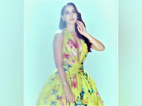 Nora Fatehi’s Floral Printed Yellow Gown