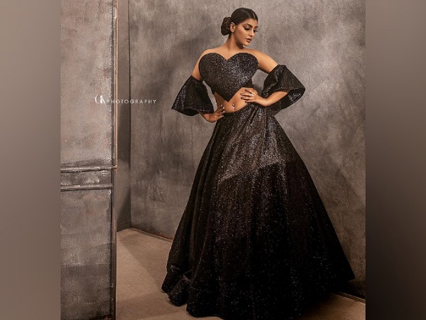 Yashika Aannand In Black Top And Skirt