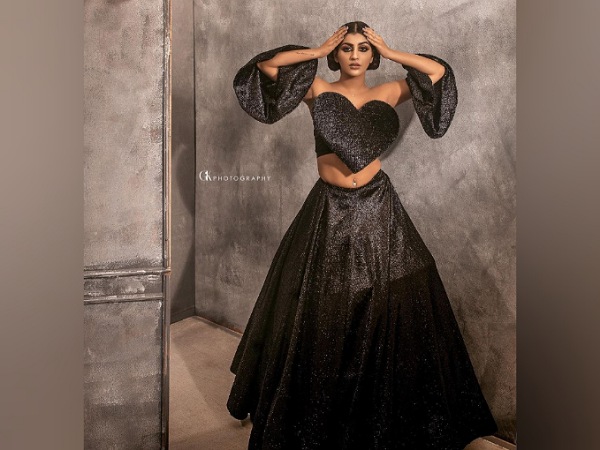 Yashika Aannand In Black Top And Skirt