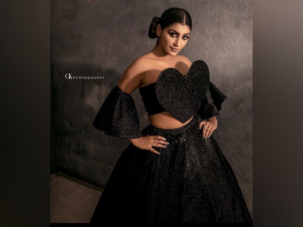 Yashika Aannand In Black Top And Skirt