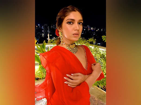 Bhumi Pednekar’s Twisted Hairdo With Red Flower
