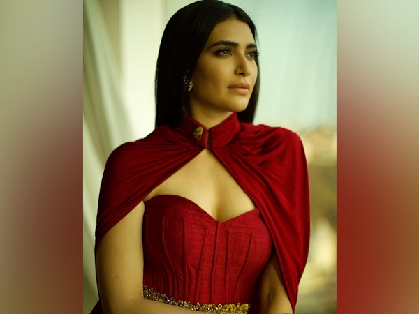Karishma Tanna In A Classy Red Cape Gown Karishma Tanna In A Classy Red Cape Gown