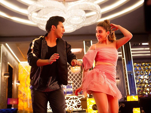 Varun Dhawan In Black And Sara Ali Khan In Pink