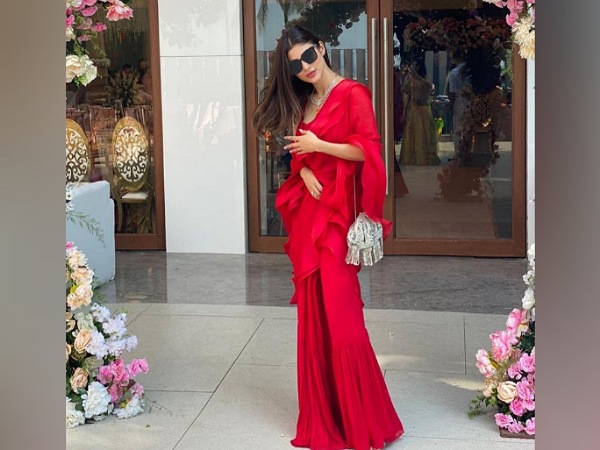Mouni Roy In A Red Ruffle Saree