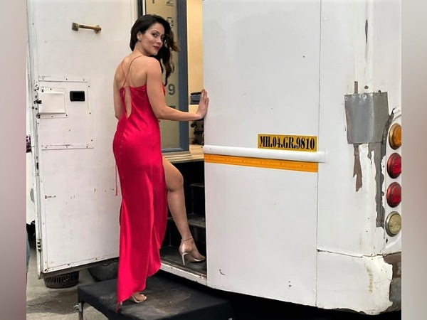 Waluscha De Sousa In A Red Slit Dress