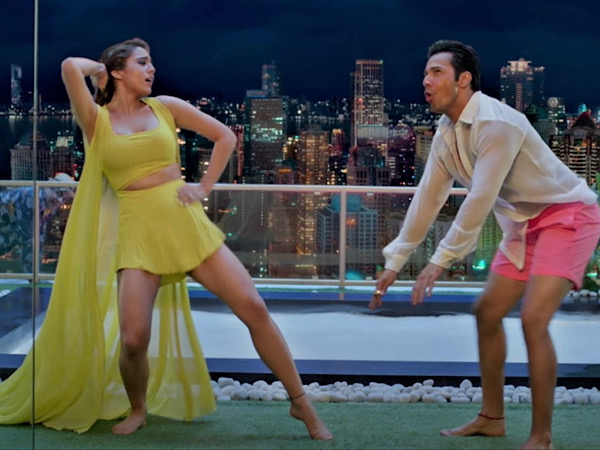 Varun Dhawan In White Shirt-Pink Shorts And Sara Ali Khan In Yellow Outfit
