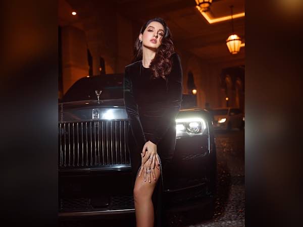 Nora Fatehi In A Bold Black Slit Gown